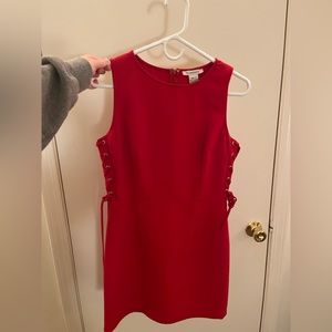 Beautiful high neck red mini dress. Ties on the side.